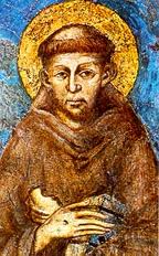 San Francesco d’Assisi in preghiera, fondatore dell’Ordine francescano, noto per la sua povertà evangelica e il Cantico delle creature, con le stigmate visibili sulle mani.